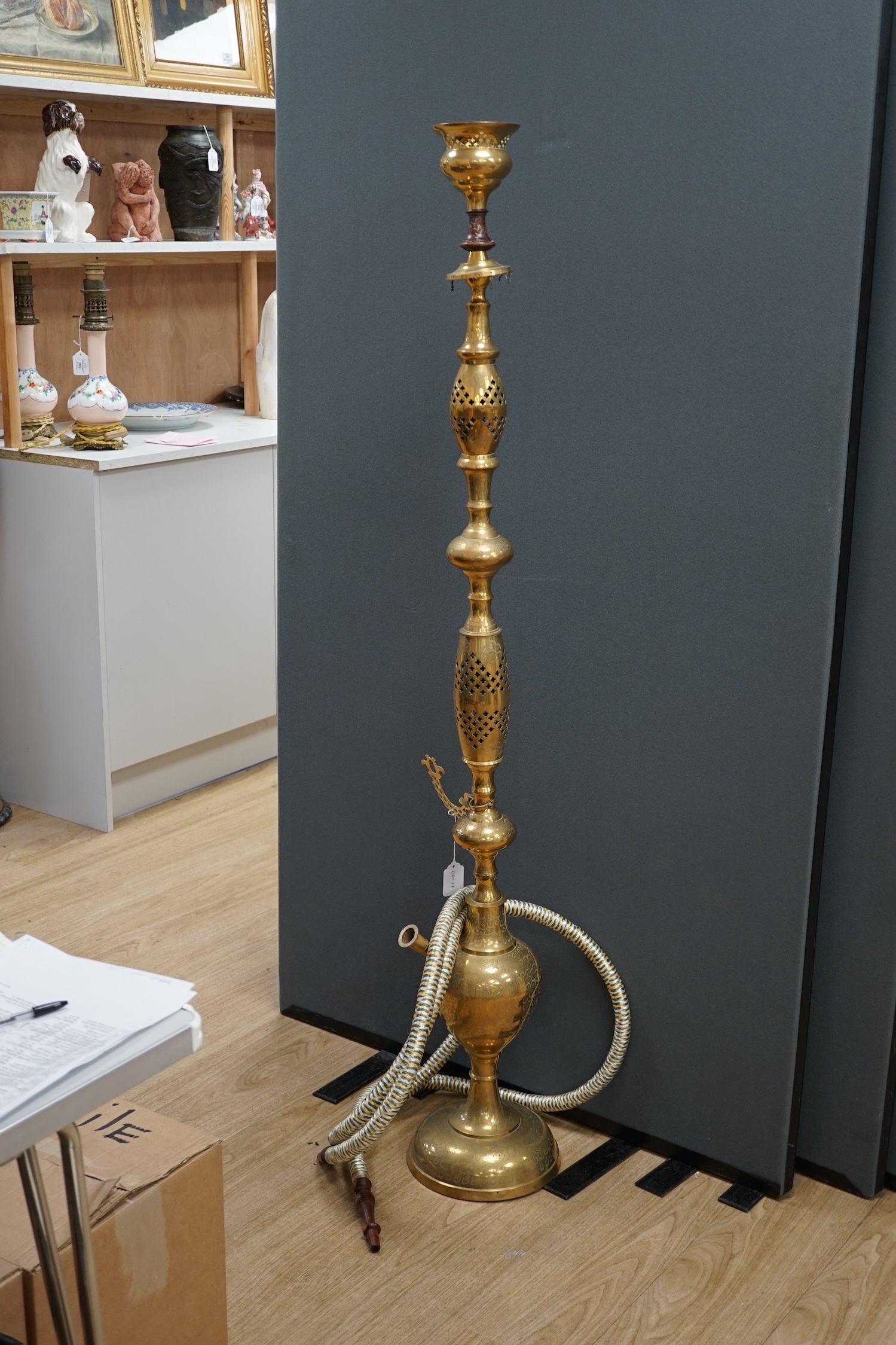 A large Middle Eastern brass hookah, 154cm